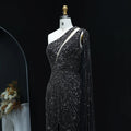 The Onyx — One-Shoulder Beaded Cape Gown