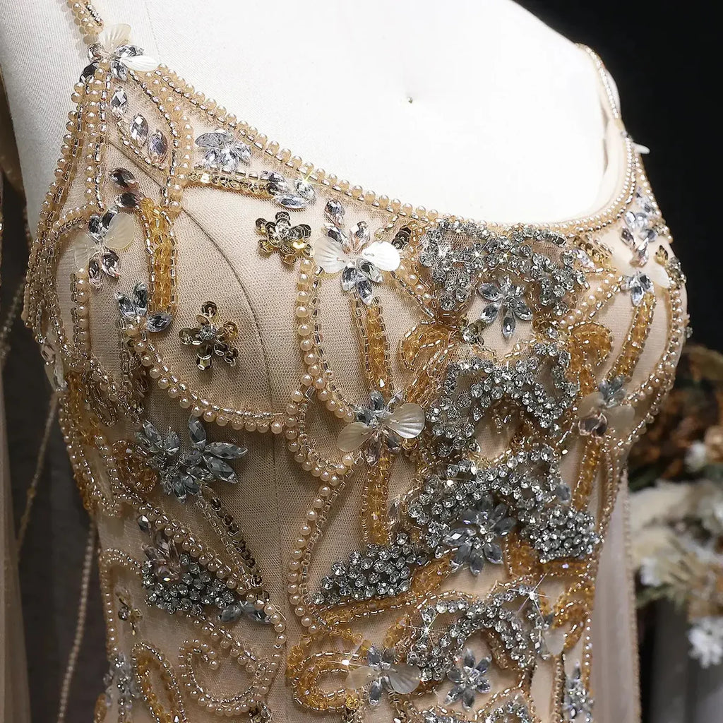 The Aurore — Champagne Beaded Glitter Sheer Cape Mermaid Gown