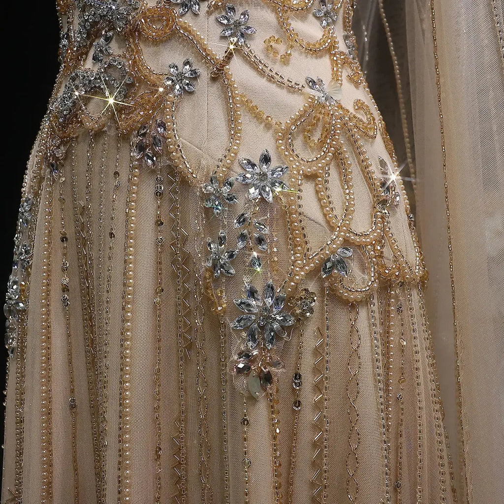 The Aurore — Champagne Beaded Glitter Sheer Cape Mermaid Gown