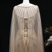 The Aurore — Champagne Beaded Glitter Sheer Cape Mermaid Gown