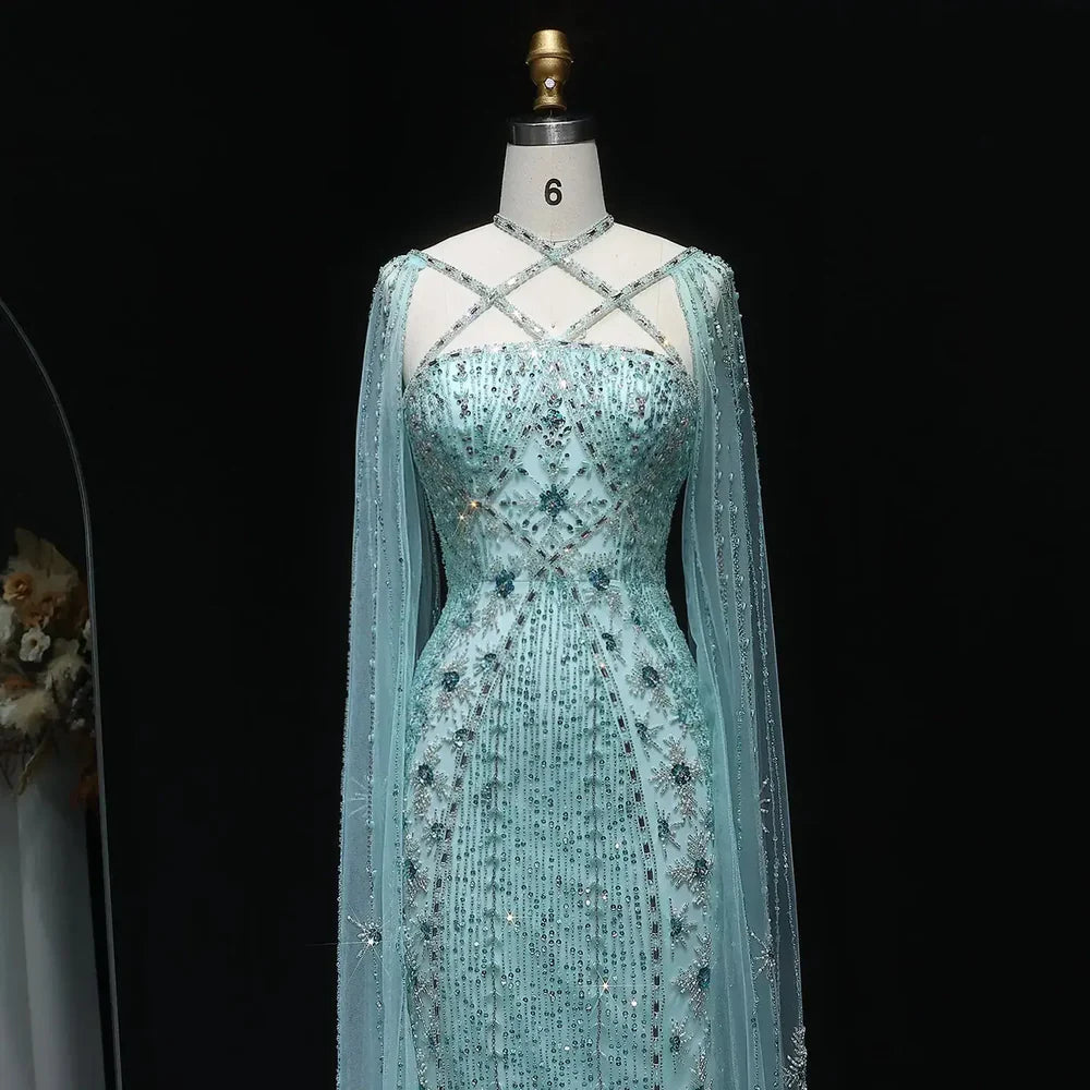 The Aqua — Crisscross Halter Cape Mermaid Gown