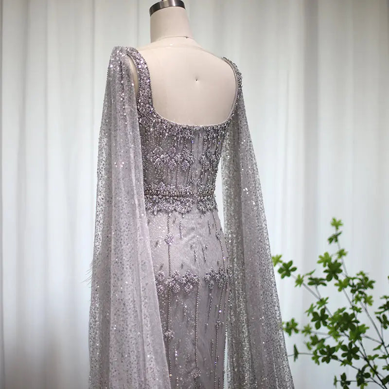 The Storm — Silver Feather Cape Mermaid Gown