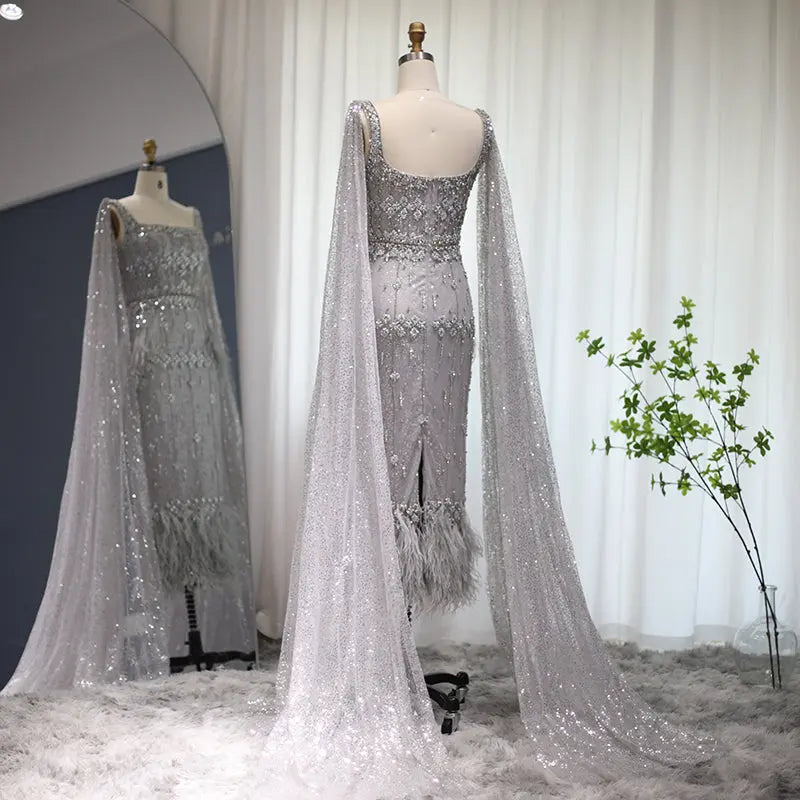 The Storm — Silver Feather Cape Mermaid Gown