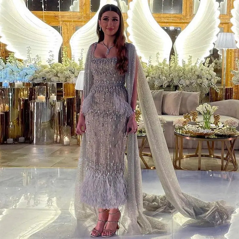 The Storm — Silver Feather Cape Mermaid Gown