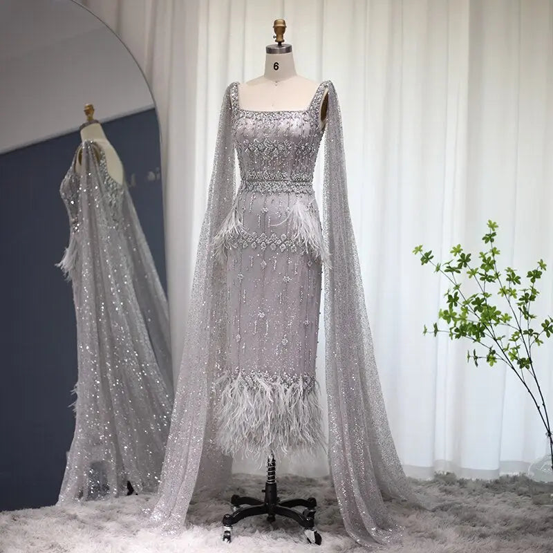 The Storm — Silver Feather Cape Mermaid Gown