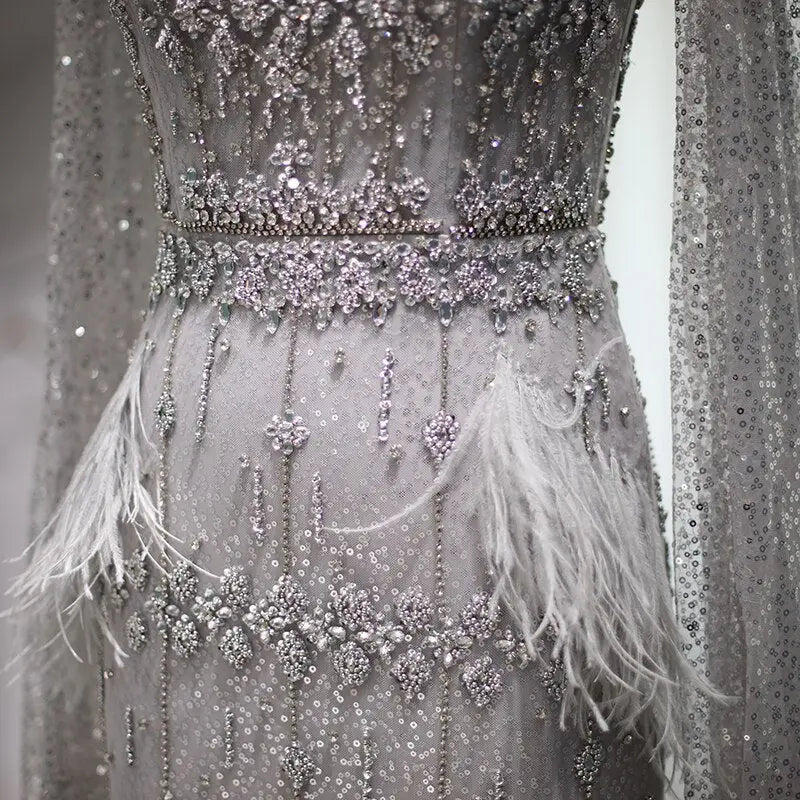 The Storm — Silver Feather Cape Mermaid Gown