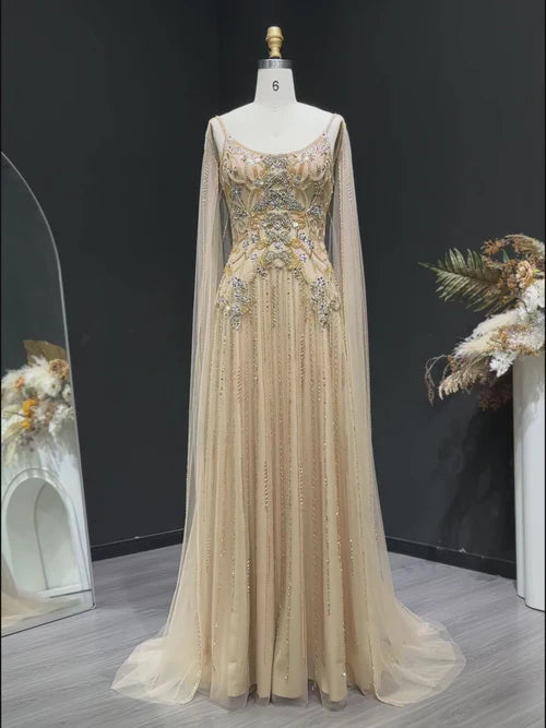 The Aurore — Champagne Beaded Glitter Sheer Cape Mermaid Gown